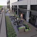 Modern Commercial Street With Pedestrian Walkway Outdoor Seating And Green Plants