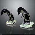 Two penguin chicks with purple and white feathers standing on ice-like bases against dark background