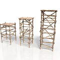 Three Natural Branch Constructed Architectural Towers With Crossed Frame Structures And Different Heights