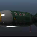 Military Bomb With Green Silver Body Red Nose Cone Yellow Warning Signs And Tail Fins