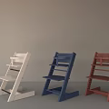 Three Wooden Children's Chairs in White Blue Red with Simple Stable Design