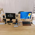 Dual Computer Monitors Setup With Keyboard Mouse And Desk Lamp On Wooden Office Desk