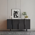 Modern Black Entryway Console Cabinet With Abstract Art White Vases And Green Plant