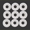 Neatly Stacked White Paper Rolls With Orange Cores On Gray Reflective Background
