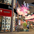 Hong Kong Style Commercial Street With Pink Dragon Decoration And Shoe Store Windows