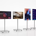 Four Modern TVs On Mobile Wheel Stands Displaying Different Screen Content 3d model