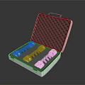 Open Metal Case with Three Blue and White Cylindrical Household Supplies and Foam Lining