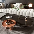 Black Coffee Table With Green Plant Decorative Figurine Books And Terracotta Side Table By Sofa