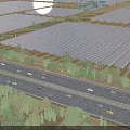 Industrial Solar Power Plant With Large Photovoltaic Panels Array Roads Vehicles And Greenery