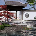 Traditional Chinese Garden Water Fountain With Koi Pond Rock Formations And Red Maple Tree