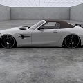 White Mercedes AMG Convertible Sports Car With Sleek Aerodynamic Design And Black Alloy Wheels