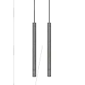 Two Modern Cylindrical Pendant Lights With Sleek Metal Finish Hanging Vertically