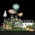 Floral Display With Colorful Flowers Welcome Sign Logo Green Plants And Grass