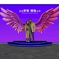 Popular Photo Check In Spot With Pink Wings Blue Platform And People Posing