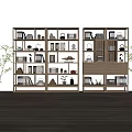 Wooden Shelf Unit With Multiple Compartments Holding Books Teapots And Decorative Items