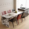 Marble Table and Chair Set with Red Black Chairs Fruit Book on Light Wooden Floor