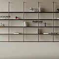 Modern Designer Bookshelf With Black Frame And Layered Shelves Holding Books And Decorative Items