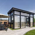 Modern Glass Pavilion with Transparent Walls and Garden Surroundings for Outdoor Leisure