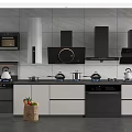 Modern Kitchen With Black Appliances White Cabinets Countertop Utensils And Vegetable Basket
