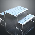 Sleek Modern Metal Furniture Set With Table Benches And Reflective Surface