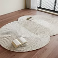 Round Woven Styled Rugs on Wooden Floor Interior with Open Book and Slippers