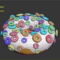 Colorful Donut Topped With White Frosting And Colorful Cereal Loops