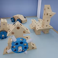 Colorful Building Blocks of Various Shapes with Holes Blue Wheels and White Tubes Assembled Structures