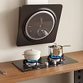 Modern Kitchen Appliances With Range Hood Gas Stove And Pots On Cooktop