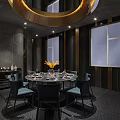 Modern Private Dining Room With Round Table Black Chairs Golden Pendant Light And Decorative Flowers