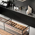 Dessert Shop Featuring Stainless Steel Countertop Black Cabinets Glass Display Case Filled With Donuts Cookies