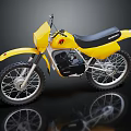 Yellow Suzuki Off Road Motorcycle With Black Seat And Shiny Wheels