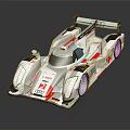 Audi White Race Car With Red Accents And Aerodynamic Design Features