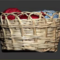 Wicker Basket Filled With Soft Colorful Yarn Balls For Household Supplies