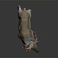 Decorative Reindeer Figurine With Large Antlers Blue And White Wreath Around Neck On Gray Background