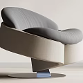 Sleek Modern Leisure Chair With Gray Beige Upholstery And Swivel Metal Base