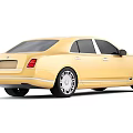 Yellow Bentley Luxury Sedan With Sleek Exterior And Chrome Alloy Wheels