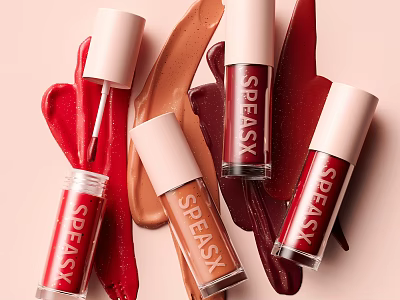 SPEASK Lip Gloss Cosmetic Products With Red Brown Shades On Pastel Pink Background 3d model