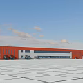 Modern Industrial Factory Building With Red Exterior Large Structure And Spacious Square Under Blue Sky