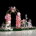 Romantic Photo Spot With Flower Arch Pink White Flowers White Bicycle Lanterns On Green Grass