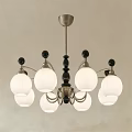 Modern Chandelier With White Lampshades Black Spherical Decorations And Metal Frame