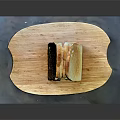 Freshly Made Golden Brown Sliced Toast with Crispy Edges on Wooden Cutting Board
