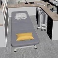 Grey Folding Bed With Yellow Pillow Grey Blanket Near White Radiator And Wooden Desk