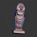 Decorative Owl Figurine With Pink Blue Woven Body Standing On A Red Hardcover Book