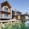 Modern Lakeside Guesthouse Building With Wooden Exterior Terrace And Water Reflection