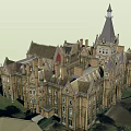 Historic Gothic Style Building With Stone Exterior Pointed Towers And Arched Windows