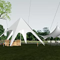 White Outdoor Tents on Green Grass with Trees Cloudy Sky and Wooden Tables