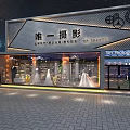 Modern Bridal Wedding Dress Store With Illuminated Window And Wedding Gown