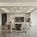 Elegant Modern Living and Dining Room Interior With Circular Pendant Lights Sofa And Coffee Table