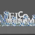 Floral Installation With Welcome Letters Blue White Flowers And Feather Accents