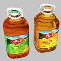 Two Bottles of Cooking Oil with Green and Red Labels and Yellow Fruits Design